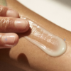 image of sunscreen being applied to arm
